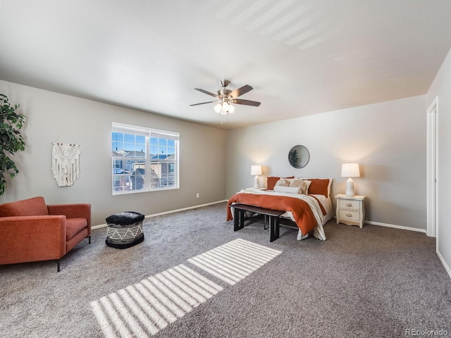 bedroom featuring ceiling fan and carpet