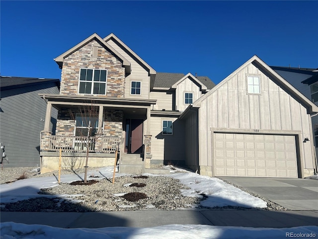 view of front of house with a garage and covered porch