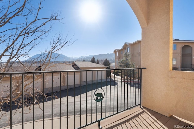 balcony featuring a mountain view