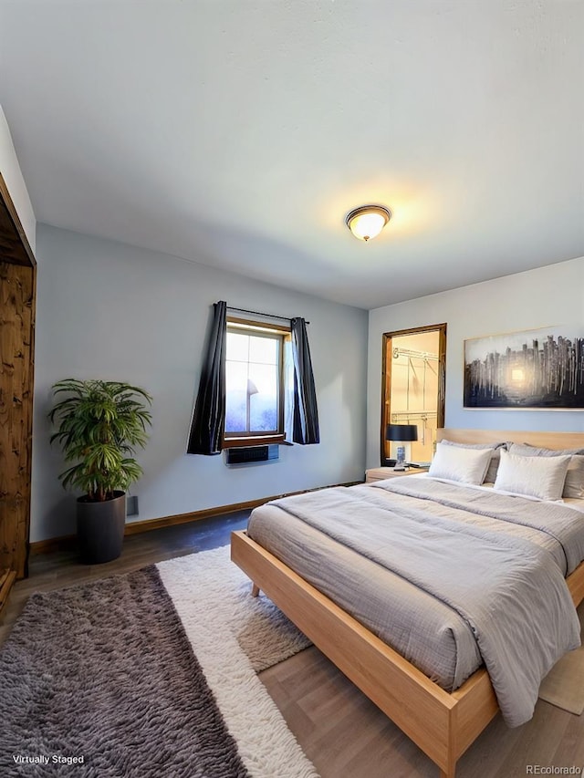 bedroom featuring hardwood / wood-style flooring