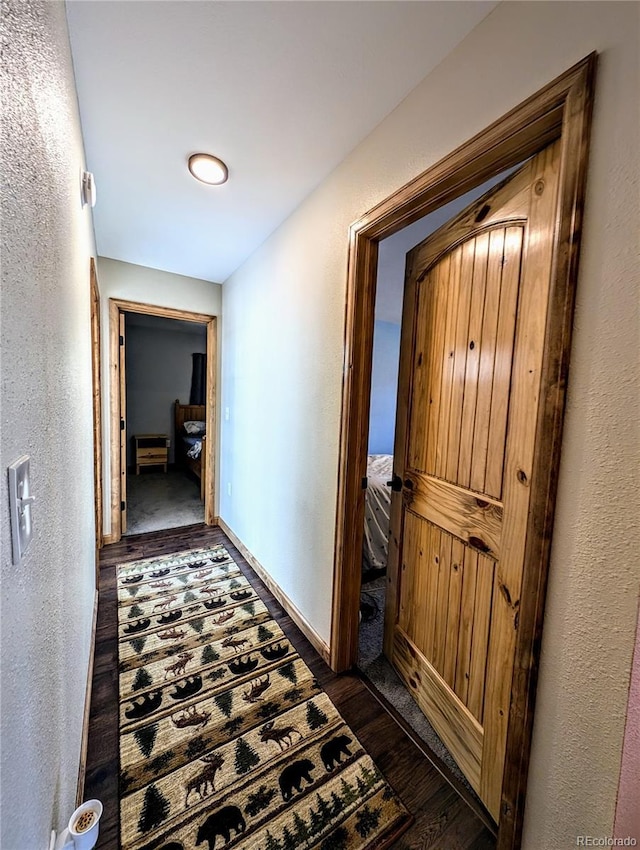 hall featuring dark hardwood / wood-style flooring