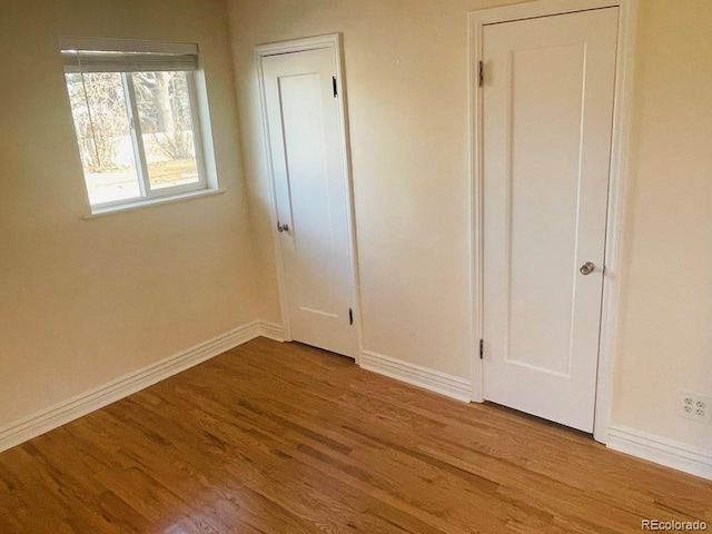 unfurnished bedroom featuring light hardwood / wood-style floors