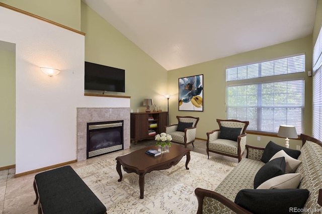 living room with high vaulted ceiling, baseboards, and a fireplace