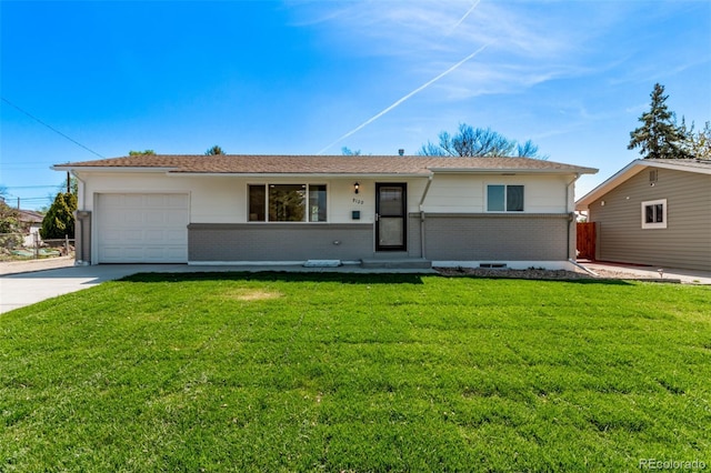 ranch-style home with brick siding, concrete driveway, and a garage