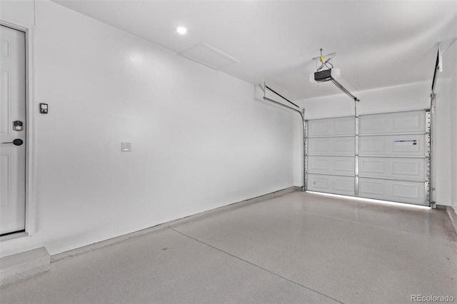 garage featuring a garage door opener