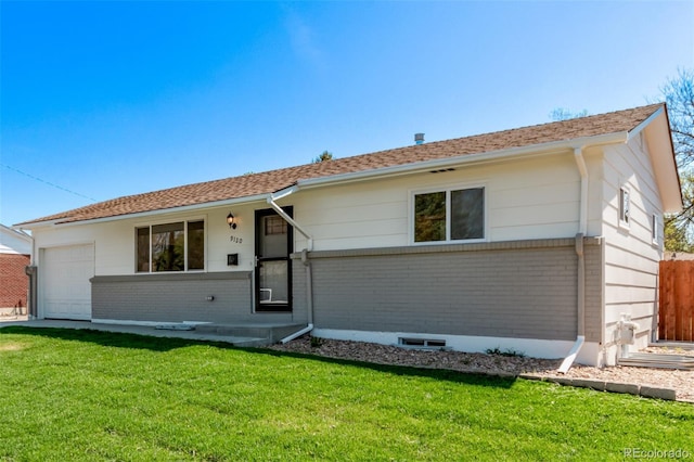 9120 Judson St, Westminster, CO 80031 - ranch-style home featuring brick siding and an attached garage
