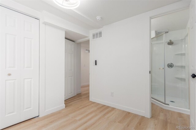 9120 Judson St, Westminster, CO 80031 - unfurnished bedroom with light wood-style flooring, a closet, and baseboards