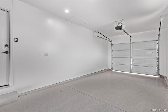9120 Judson St, Westminster, CO 80031 - garage featuring a garage door opener