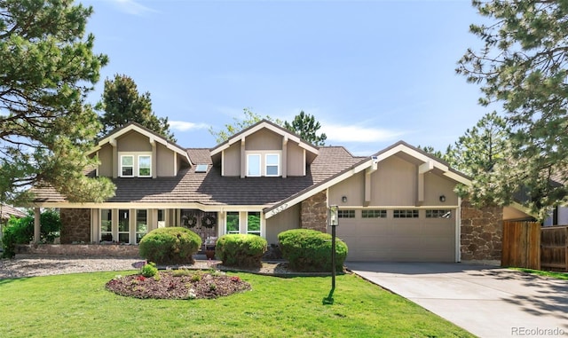 5557 E Links Cir, Centennial, CO 80122 - view of front of home featuring stone siding, an attached garage, and concrete driveway