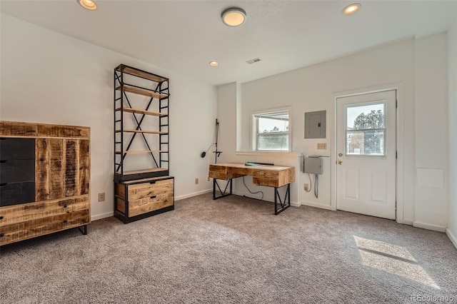 carpeted entrance foyer with electric panel, visible vents, recessed lighting, and baseboards