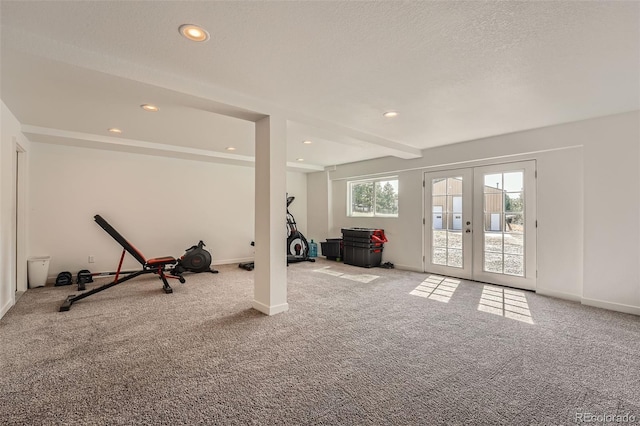 workout room featuring carpet, recessed lighting, french doors, and baseboards