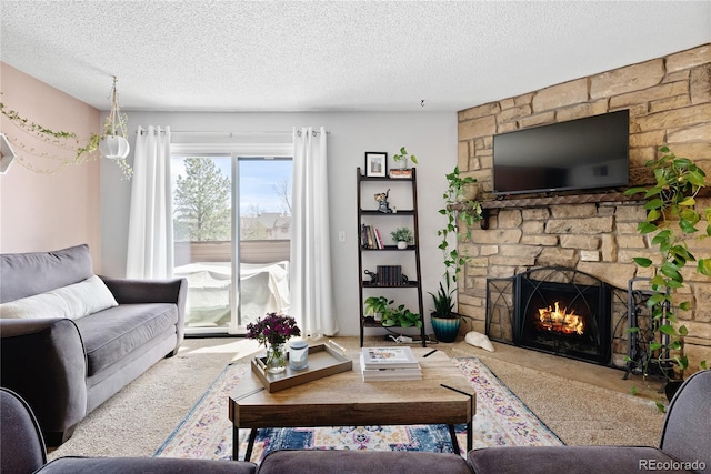 209 Wright St Unit 204, Lakewood, CO 80228 - living room with a stone fireplace and a textured ceiling