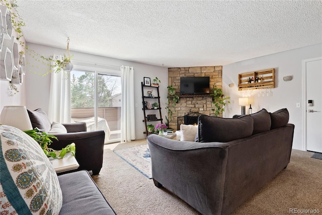 209 Wright St Unit 204, Lakewood, CO 80228 - carpeted living room with a fireplace and a textured ceiling