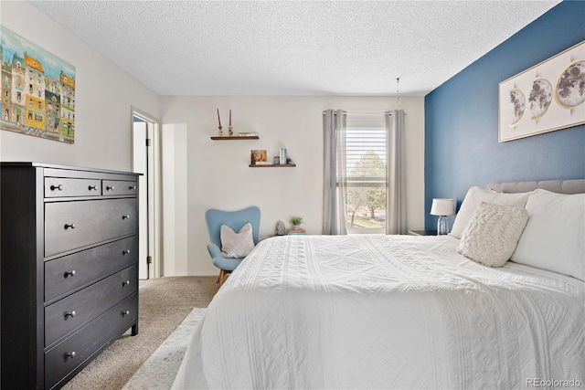 209 Wright St Unit 204, Lakewood, CO 80228 - bedroom featuring carpet floors and a textured ceiling