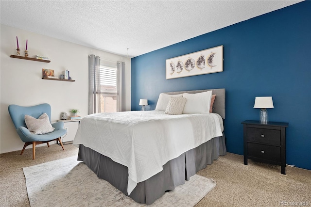 209 Wright St Unit 204, Lakewood, CO 80228 - bedroom featuring light carpet and a textured ceiling