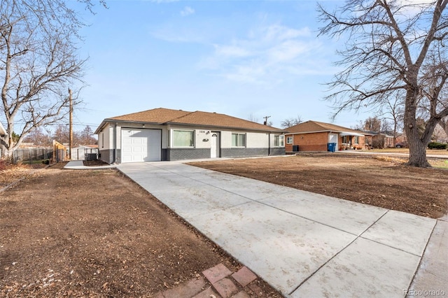 ranch-style house featuring a garage