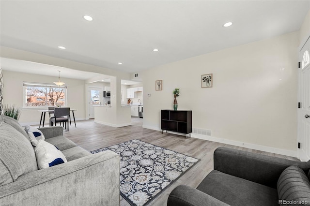 living room featuring light hardwood / wood-style floors