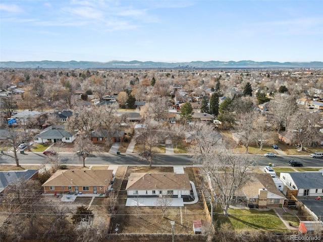 birds eye view of property with a mountain view