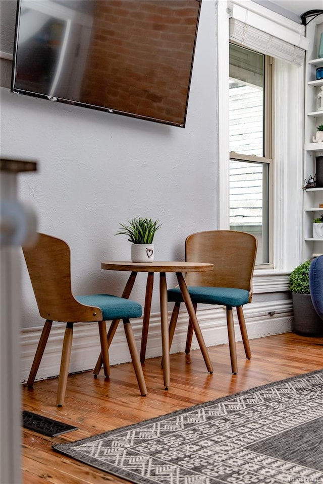 living area featuring hardwood / wood-style flooring