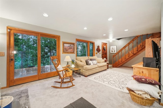 carpeted living room featuring a wealth of natural light