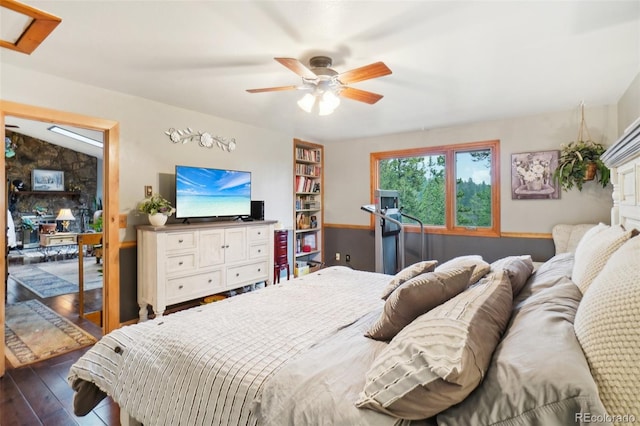 bedroom featuring dark hardwood / wood-style floors and ceiling fan