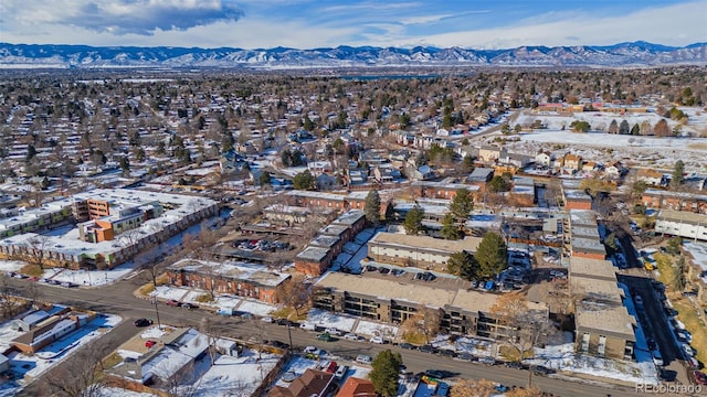 birds eye view of property featuring a mountain view