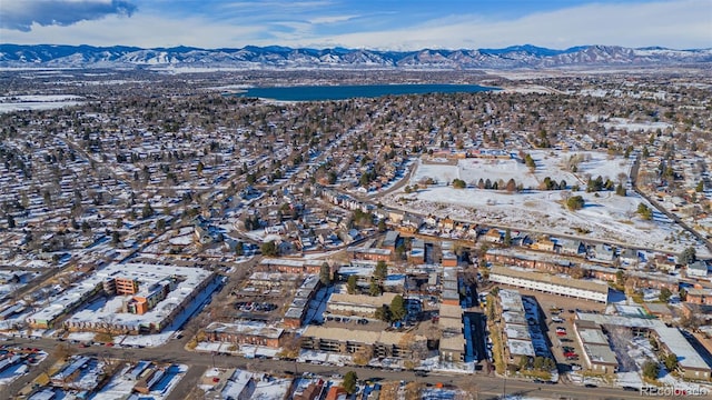 birds eye view of property featuring a mountain view