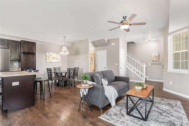 15800 E 121st Ave Unit 3, Brighton, CO 80603 - living area with stairs, dark wood-type flooring, and ceiling fan