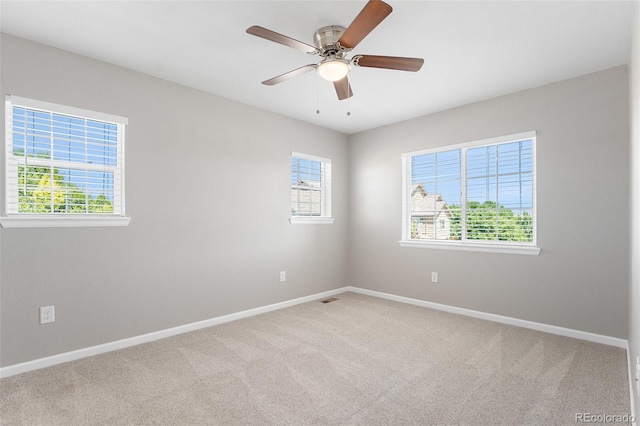 15800 E 121st Ave Unit 3, Brighton, CO 80603 - empty room featuring healthy amount of natural light, carpet floors, and a ceiling fan