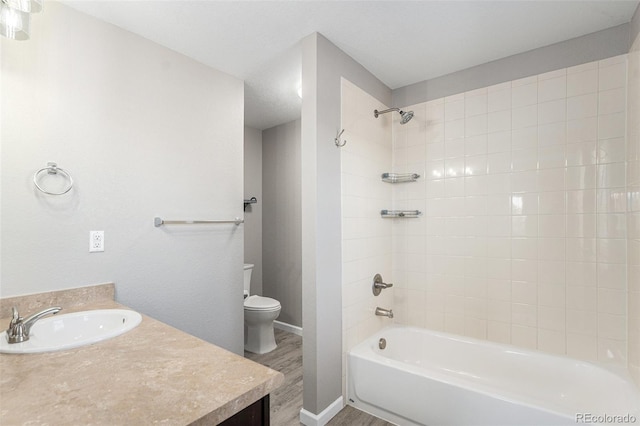 15800 E 121st Ave Unit 3, Brighton, CO 80603 - bathroom with vanity,  shower combination, and wood finished floors
