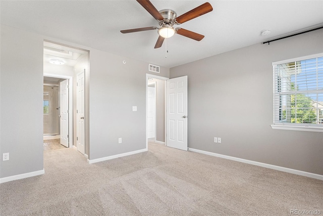 15800 E 121st Ave Unit 3, Brighton, CO 80603 - unfurnished bedroom featuring light colored carpet, ensuite bath, and ceiling fan