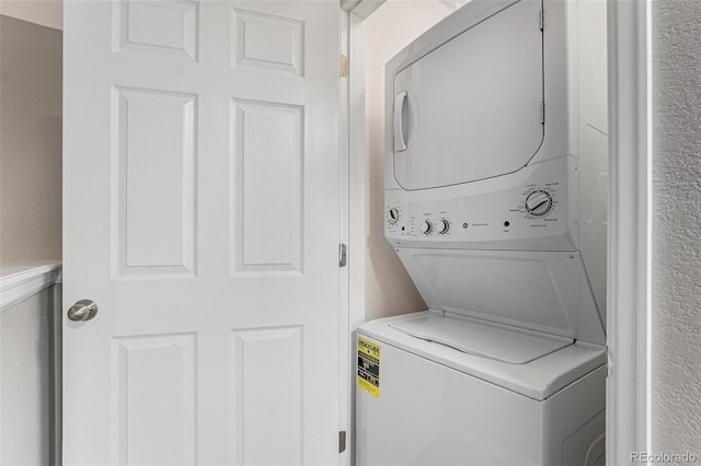 15800 E 121st Ave Unit 3, Brighton, CO 80603 - washroom featuring estacked washer and dryer
