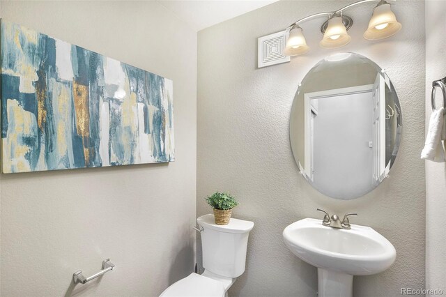 15800 E 121st Ave Unit 3, Brighton, CO 80603 - bathroom with toilet and a sink