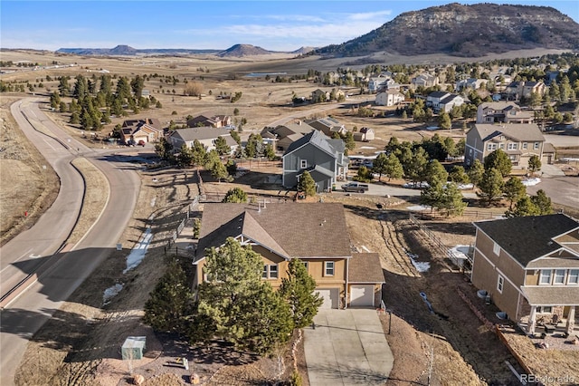 birds eye view of property with a residential view and a mountain view