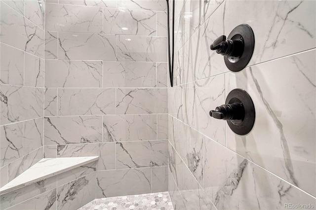 details with a tile shower