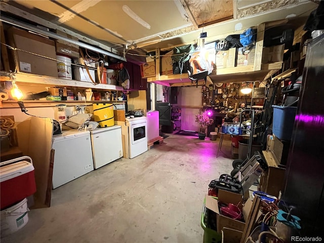 interior space with washing machine and dryer and refrigerator