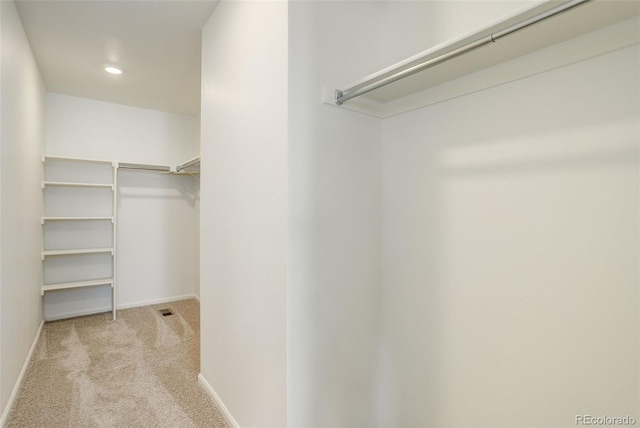 walk in closet with carpet flooring and visible vents