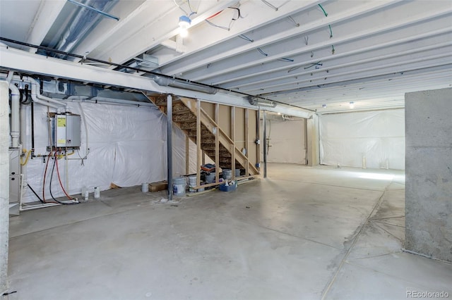 garage featuring tankless water heater