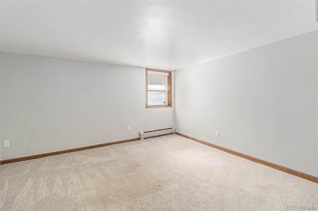 813 E 14th Ave Unit 4, Denver, CO 80218 - spare room with a baseboard radiator and carpet flooring