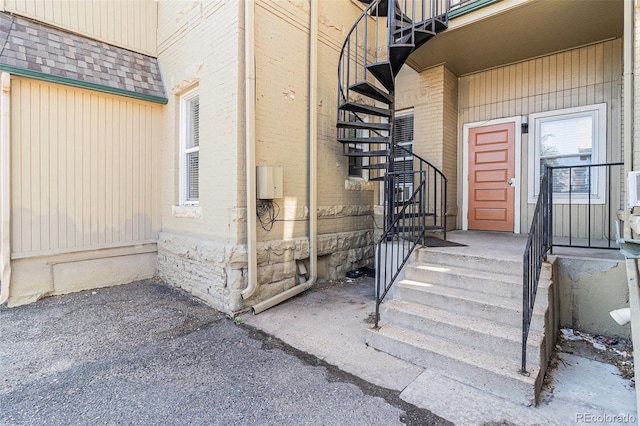 813 E 14th Ave Unit 4, Denver, CO 80218 - entrance to property with roof with shingles and brick siding
