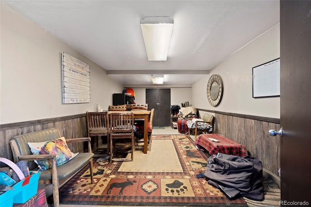 1705 Outter Marker Rd, Castle Rock, CO 80108 - office area with a wainscoted wall, carpet flooring, and wood walls