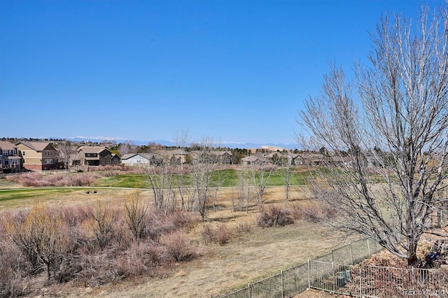 6971 S Netherland Way, Aurora, CO 80016 - view of yard with a residential view and fence