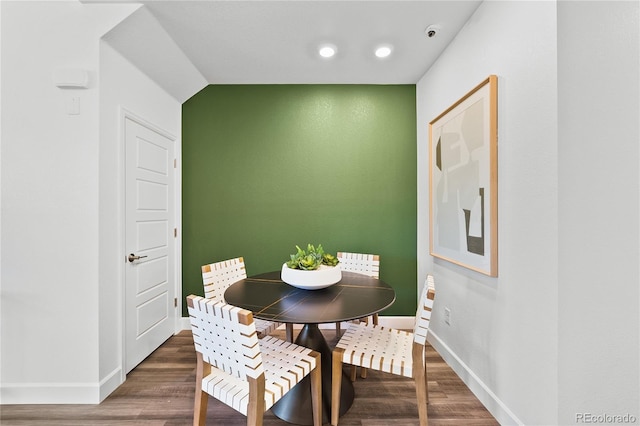 dining area with baseboards, recessed lighting, and wood finished floors