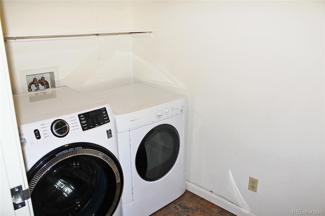 clothes washing area with laundry area and separate washer and dryer