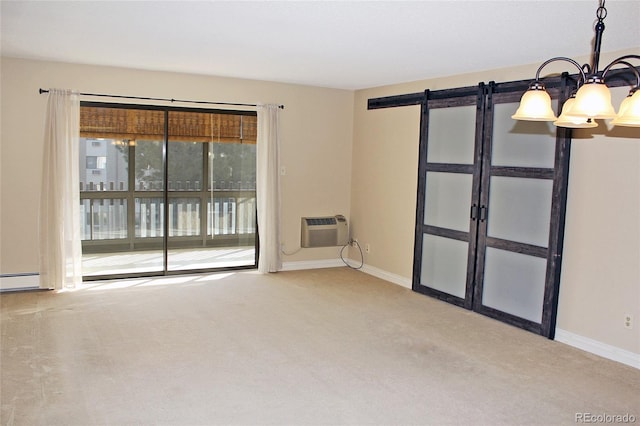 empty room featuring baseboards, an AC wall unit, carpet floors, and a notable chandelier