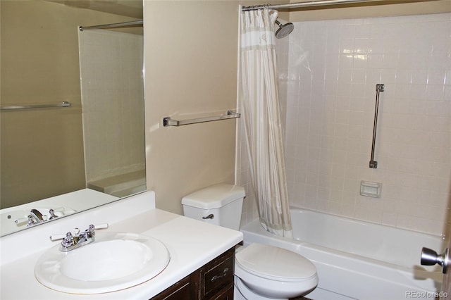 full bathroom with shower / tub combo with curtain, vanity, and toilet