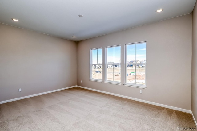 view of carpeted spare room