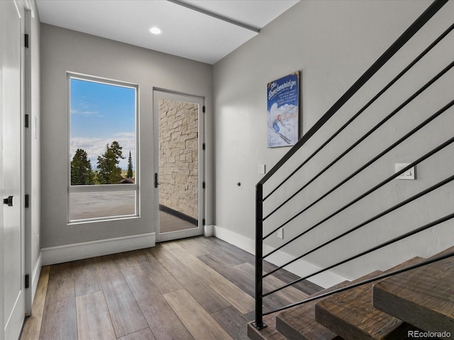 436 N Fuller Placer Rd, Breckenridge, CO 80424 - entryway featuring baseboards, wood finished floors, recessed lighting, and stairway