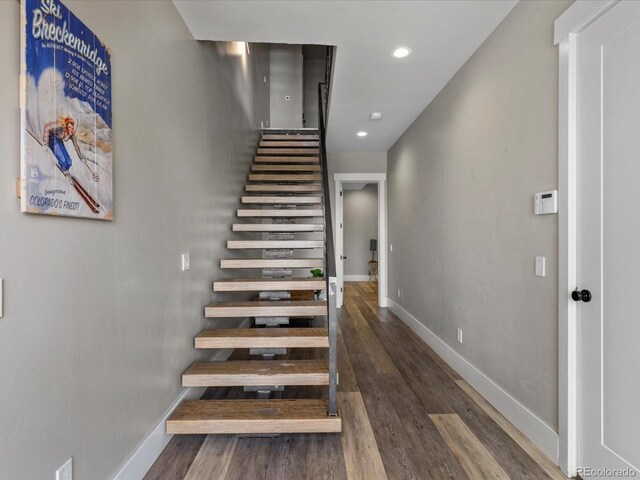 436 N Fuller Placer Rd, Breckenridge, CO 80424 - staircase with wood finished floors, baseboards, and recessed lighting