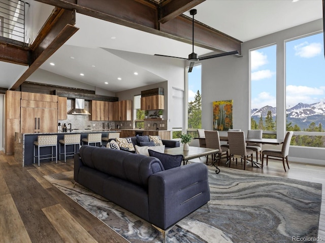 436 N Fuller Placer Rd, Breckenridge, CO 80424 - living room with a mountain view, dark wood-style flooring, recessed lighting, and healthy amount of natural light